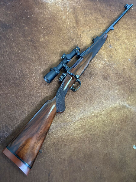 Rigby Highland Stalker chambered in 9.3X62 with genuine quick detach Hexalock scope mounts and a Leupold VX-3 HD 1.5-5 scope.