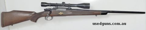 Great solid deer rifle in 270W. Has burris bridge with steel weaver K8. Stock has some ornate carving. Note grip cap is missing.