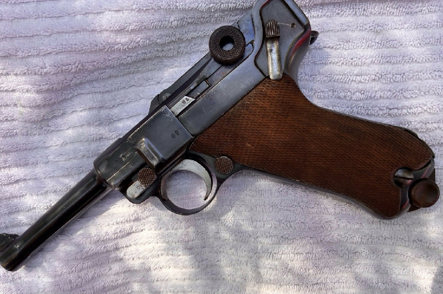 1917 P08 Luger. Manufactured by  DWM company, they where the original and primary maker of the P08. This P08 is in very good condition for its age, unfortunatel