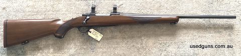 A nice M77 which in very tidy condition. Bluing and timber also vey good.