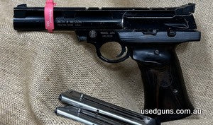 #585/137 2x Magazines that eject nice and freely. Ergonomic grip for left or right handed. I list all my guns as Fair unless they are new, it is up to you to ju