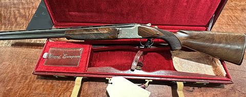 Very clean Winchester Grand European with stunning engraving on action and still in its original case that itself has no breaks or tears and the leather locking