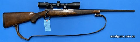 A 7x64 Ruger M77. 7x64!. Mounted is a Nikko Stirling Platinum 3-10x42. Rifle in good nick. Some marring to the floorplate otherwise good operating condition.