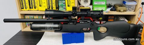 FX Crown in excellent condition with water cooled pump & ZeroTech Trace 3-18x50 scope in sports match rings. Comes with approximately 6 full tins of slugs. High