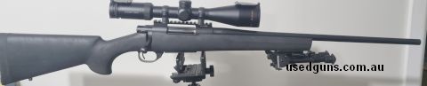Howa 1500, Hogue stock.  shoots 140gn speer well. Leupold rail, Burris rings.  has a few small marks/scratches