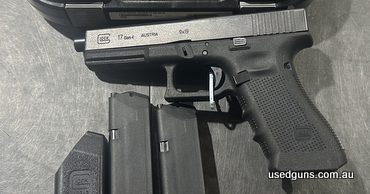 Pistol presents in excellent condition with minimal use. Comes with original case/2 magazines and grip straps