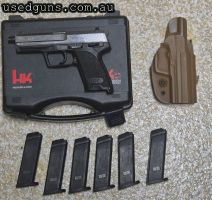 Comes with 6 mags and a holster. great gun and you can live out your tomb raider fantasies with the misso