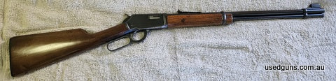 Top quality rifle considered to be one of Winchesters best. Marks on stock and some blue missing. Rusty patch near rear sight has original front and rear sights
