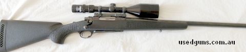 Varmint heavy barrelled 22.250 in a bell and carlson synthetic stock.has a Japanese 4-12x56 scope has a ding in the outer front tube but doesn't affect it.shoot