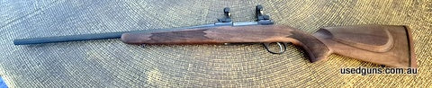 This gun was purchased new 5 years ago and has had 5 shots through it. Has sat in the safe ever since. Has a small blemish on the barrel bluing where another ri