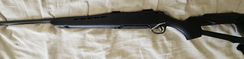 Mossberg 4x4 338wm plus postage