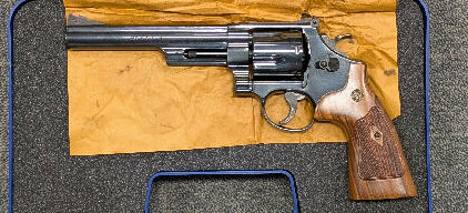 A Smith & Wesson Model 29-10 in 44 Magnum in excellent condition. The previous owner states that this pistol has only fired 10 rounds. Comes in blue plastic S&W