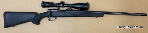 very good condition Howa 1500 varmint fluted chambered in 204 Ruger with a Redfield Accuranger rifle scope 6-18x50. black Hogue stock and factory hinged floor p