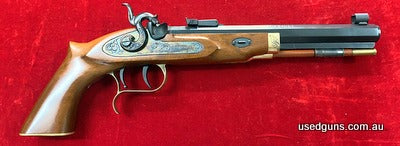 Thompson Patriot 36 Cal BP Target Pistol .Set Triggers Part Engraved .This firearm is unfired .Engraving by Michael Gouse Montana Art Emporium USA