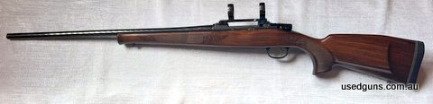 Spiral faceted barrel. Stock and action engravings. Desirable Mauser action in a great European calibre. 1:8 twist rate, single set trigger. Original high gloss