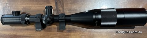 Nightforce BR 12-42x56 German post reticle. Includes UTG Pro rings to suit 11mm dovetail, lens shade and caps. Minor scuff marks on tube. Glass is immaculate. $