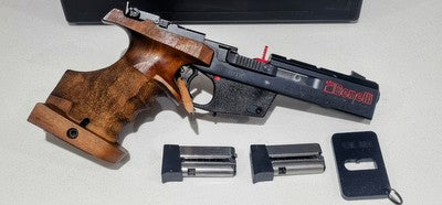 6 shot magazines, comes with large ergo grip as pictured and factory ambidextrous grip. Some other spares not in picture included.