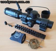 Bushnell 1-4x24 BTR -2 30mm illuminated BDC reticle, bought to try instead of iron sights on my Remington 7615 but not for me. Included 30mm Vortex Rings and 20