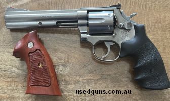 Smith & Wesson 686 in good working order with extra new wood grip ONO. Buyer to pay for shipping and dealers fees.