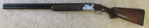 Beretta 682 Trap 12G. 30 inch barrels. Chokes 3/4 and Full. Lop 14-1/2‚Äö√Ñ√∂‚àö√ë‚àöœÄ , 365mm . Adjustable Trigger. Top Lever well to the right. Walnut Stock,
