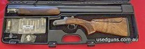 Nice gun not being used, grade 6 wood, hard case and chokes