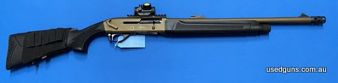 Very good condition Bushmeister BA-X12 Tactical FDE 12G lever release shotgun. 20 inch barrel with a muzzle brake. Bushnell TRS-25 red dot sight mounted on the 