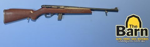 Stirling model 20 22LR. Cat C semi-auto. Has front sight but not back sight. Has a dovetail rail for scope mounting. Is in good condition.