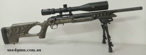 Ruger American Rimfire with Bushnell Trophy 6-24x50 and bipod. Clean bore and stock. Barrel has rust and pitting along top side, most prominent between scope an