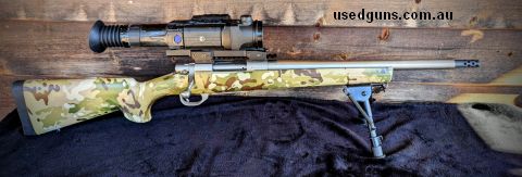 Scope, base, muzzle brake and bipod not included. Purchased new as a 24" varmint stainless barrel then had it cut down to 16.25" and threaded 5/8x24. Has been u