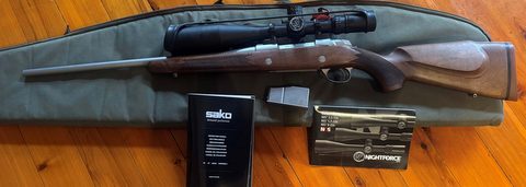 In excellent condition. Fired less than 150 rounds, comes with bag and 4 round magazine.