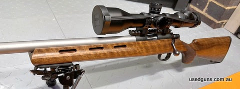 Immaculate 57M in hard to find left hand. Barely shot over the years, maybe a few hundred. AA+ hand select Claro Walnut with a gorgeous tiger stripe grain, stai