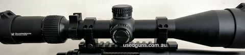 Less than 6 months old. In immaculate condition with absolutely zero wear of any kind. Best budget long range scope on the market, quality glass, tactile and au