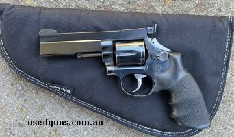 Model 16 Service 25 Gun. .32 Mag. Custom barrel. Aristocrat sight rib. Bobbed Hammer.