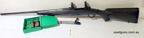 Timney trigger, 1 inch rings and 2 die set. Postage $60 stock ID C36