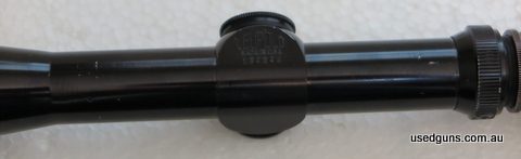 Leupold Vari X II 2-7x32 with early reticle, similar to the Post and Duplex type. Fine horizonal, heavier crosshair down and thicker pointed post. Or close to t