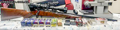 Great small game rifle with a beautiful stock, dark deep blueing. Comes with at least 450 rounds. Comes with Scope that is brand new, 5 shot steel magazine that