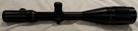 Fine crosshair reticle (illuminated) comes with front extension tube retiring shooter due to age has aftermarket rear cap price excludes postage, still regarded