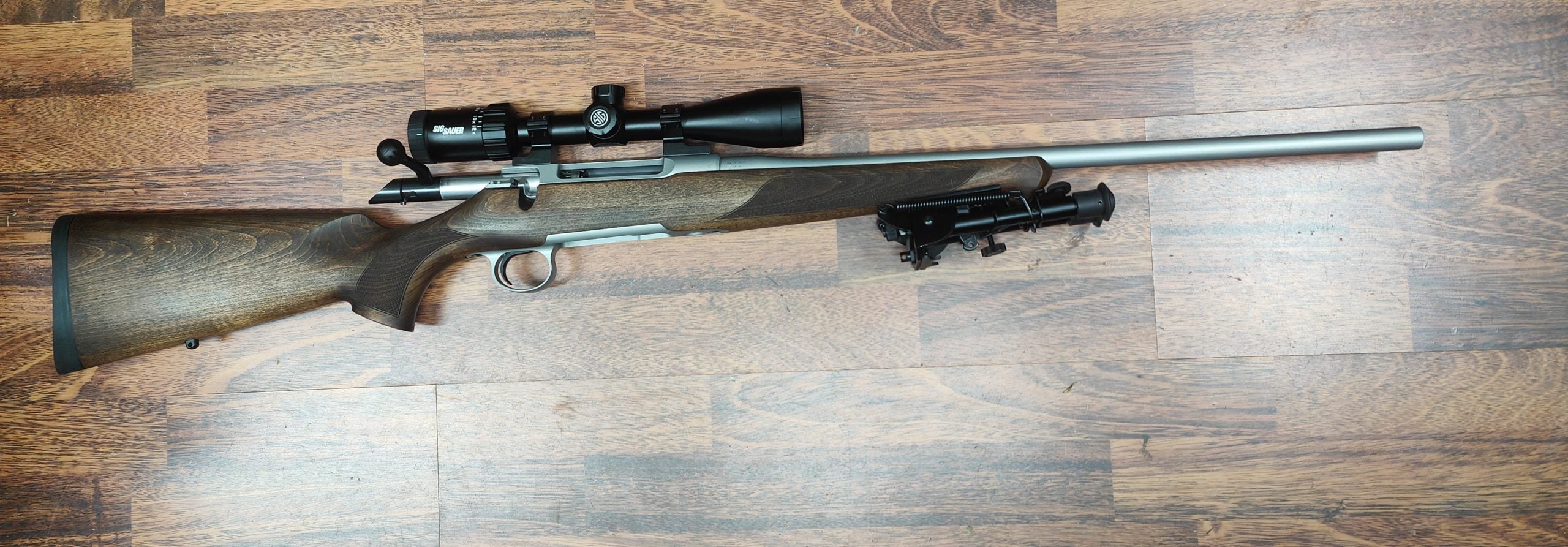 SAUER 100 CLASSIC WALNUT 223,with SIG SAUER 4-12X40 WHISKEY 3 scope in as new excellent condition. Plus postage to your nominated dealer