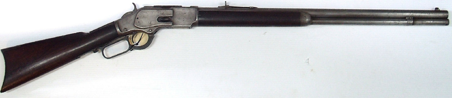 Winchester Model 1873 Lever action 44-40(44WCF).  Manufactured in 1876.  Unfortunately "fair" doesn't do this gun justice and is definitely a restoration projec