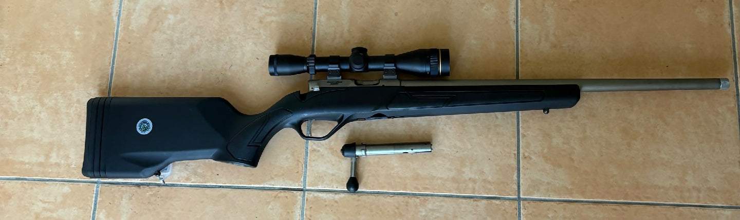 Right-Handed Lithgow Crossover in .22LR with Leupold 3-9x33 Rimfire EFR Scope with Adjustable Objective.  Shot several thousand rounds of Eley Club in Field Rif
