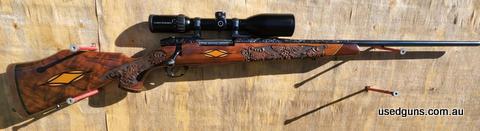 Weatherby Crown Custom in 300 Weatherby magnum. Beautifully factory engraved Barrell and stock, rifle is in Superb condition. Rings and mounts included. Scope n