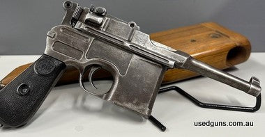 This C96 Bolo comes complete with reproduction Bakelite Grips along wood shoulder stock, Was produced in 1915. The condition of the pistol is "Fair to Good" for
