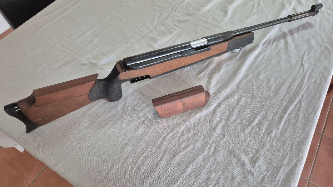 Feinwerkbau air rifle in excellent condition. Comes with left and right handed check piece. Comes with factory peep sights, not pictured.