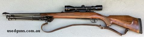 Spot light, tripod, leather strap, cleaning kit and additional hair trigger fitted to gun.