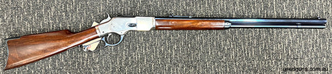 uberti 1873 rifle chambered in 45 long colt . this rifle has a charcoal blue finish on its 24"octagonal barrel and coin finish on action in very good condition