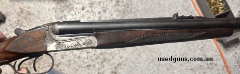 merkel double in 500 nitro. includes Hornady dies and 26 loaded rounds and 26 empty cases. . bluing a little thin from being carried, lovely engraving and upgra