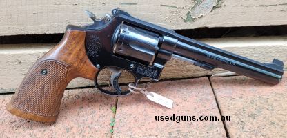 Smith & Wesson Model 14-2 in good working condition. Fitted with a removable wide trigger, slight wear to finish on edges of frame. Buyer to pay postage to nomi