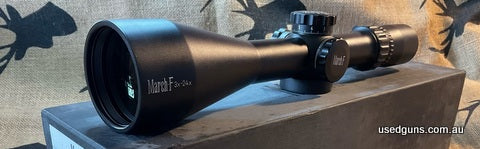 Perfect condition March F 3-24x52 super clear optic comes in original box with sunshade- 2 x lens covers one set flip up-throw lever etc $2400ono