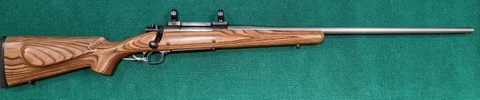 Winchester model 70 in good condition. Right hand action with left hand stock. Rings and mounts included.