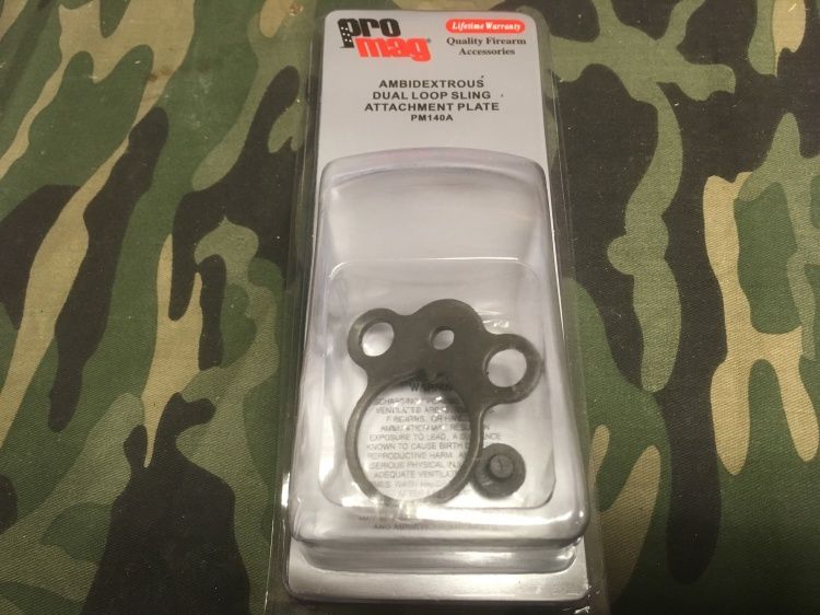 Ambidextrous sling plate